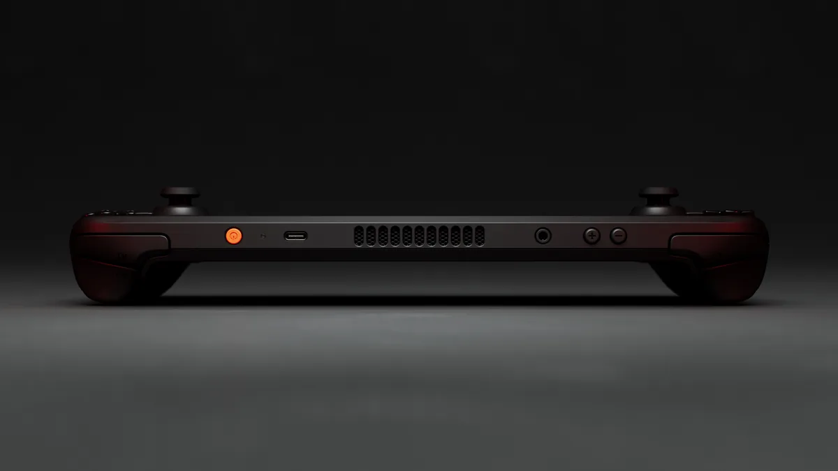 Valve Steam Deck OLED - Top profile showing USB-C port, 3.5mm audio jack, volume rocker, and exhaust vent